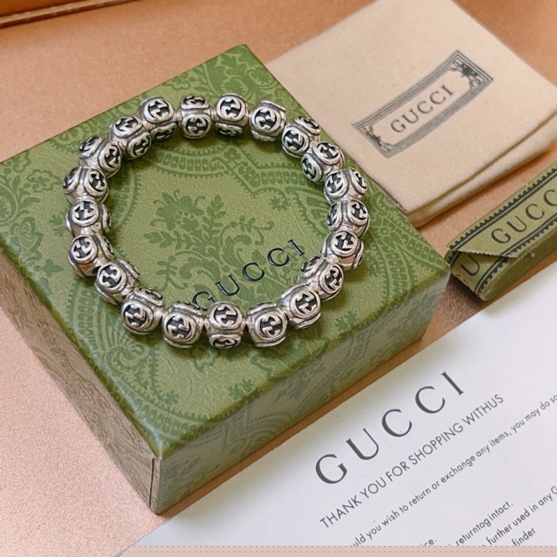 G*u*i bracelets